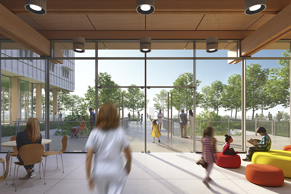 Φωτογραφία τραβηγμένη από εσωτερικό χώρο ενός νοσοκομείου η οποία δείχνει την προς την έξοδο και κόσμος περπατάει στον χώρο αυτό 