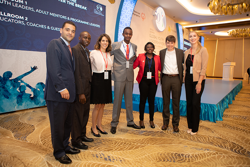 Stavros Niarchos Foundation and Global Youth Leadership Forum members stand together for a picture at the Forum